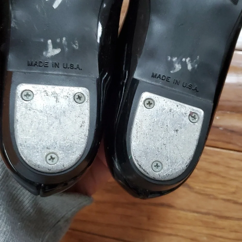 Black patent tap dance shoes